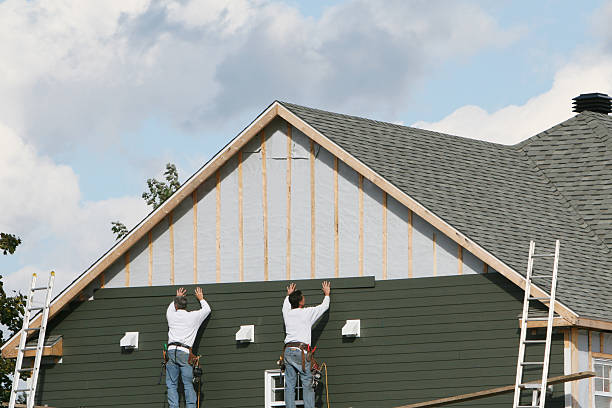 Professional Siding technician working in Stow, OH